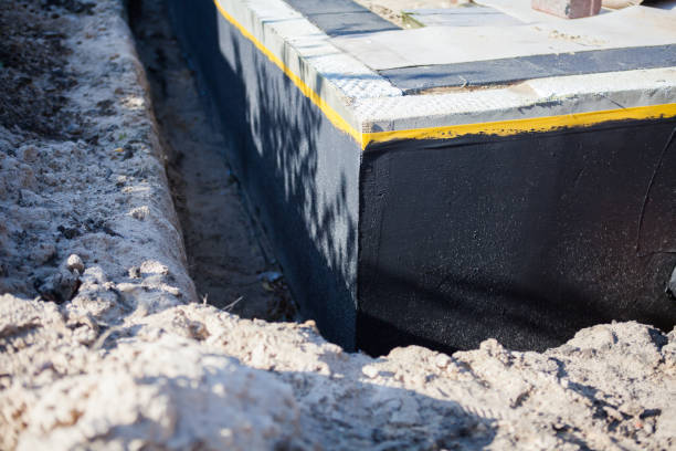 Professional Waterproofing technician working in Canton, NC
